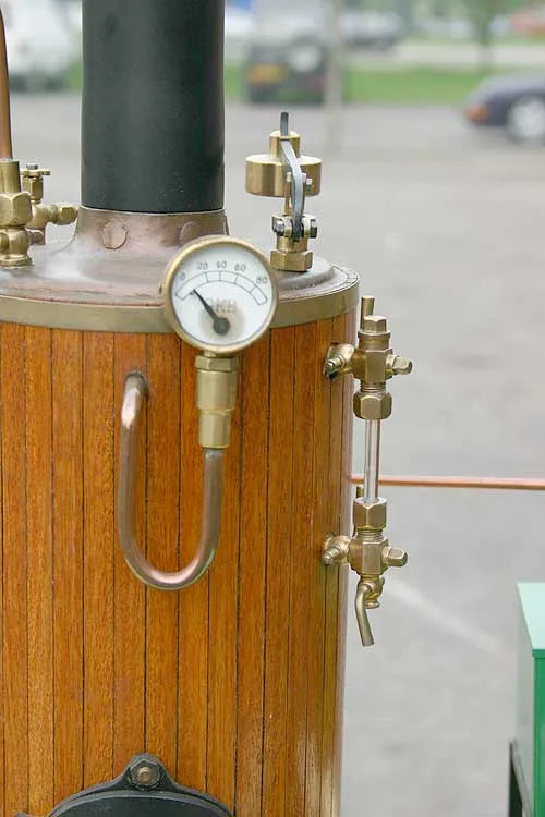 Coal-fired boiler with vertical engine