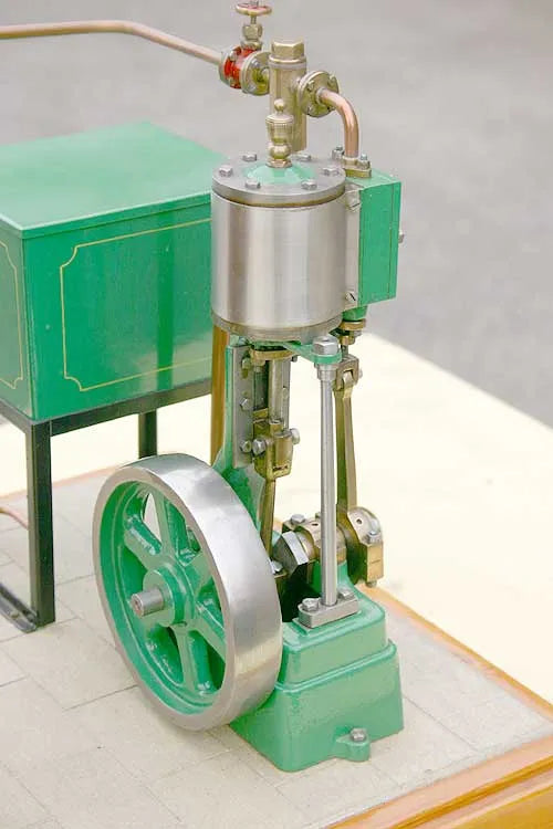 Coal-fired boiler with vertical engine