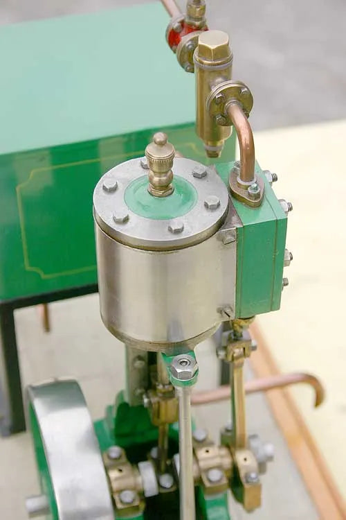 Coal-fired boiler with vertical engine