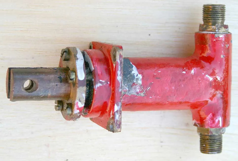 Twin ram axle pump and straps