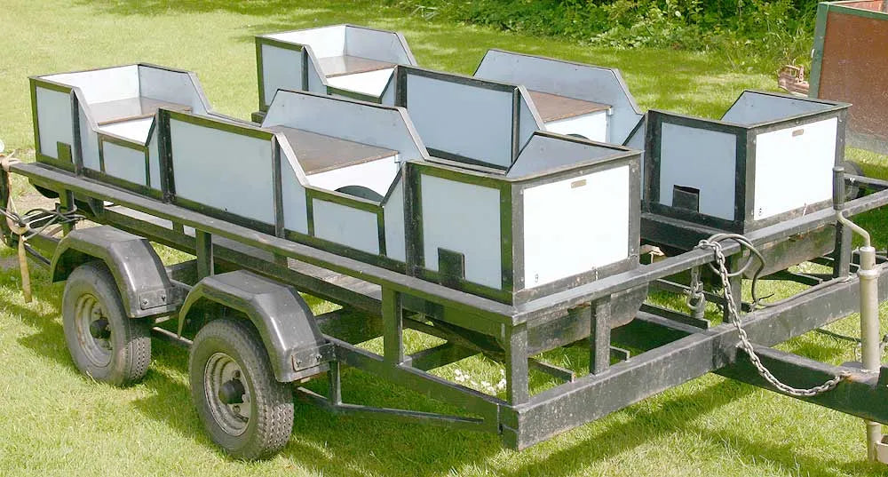 Pair 7 1/4 inch gauge coaches on trailer