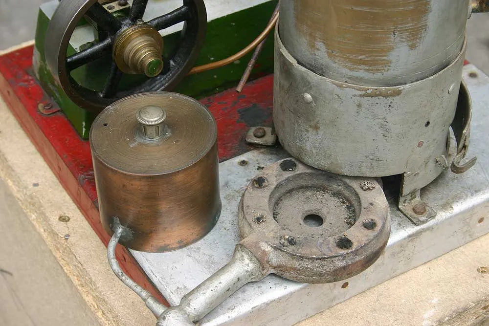 Small stationary steam plant with brass boiler