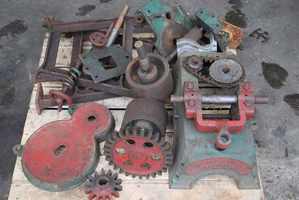 Dismantled cast iron corn mill