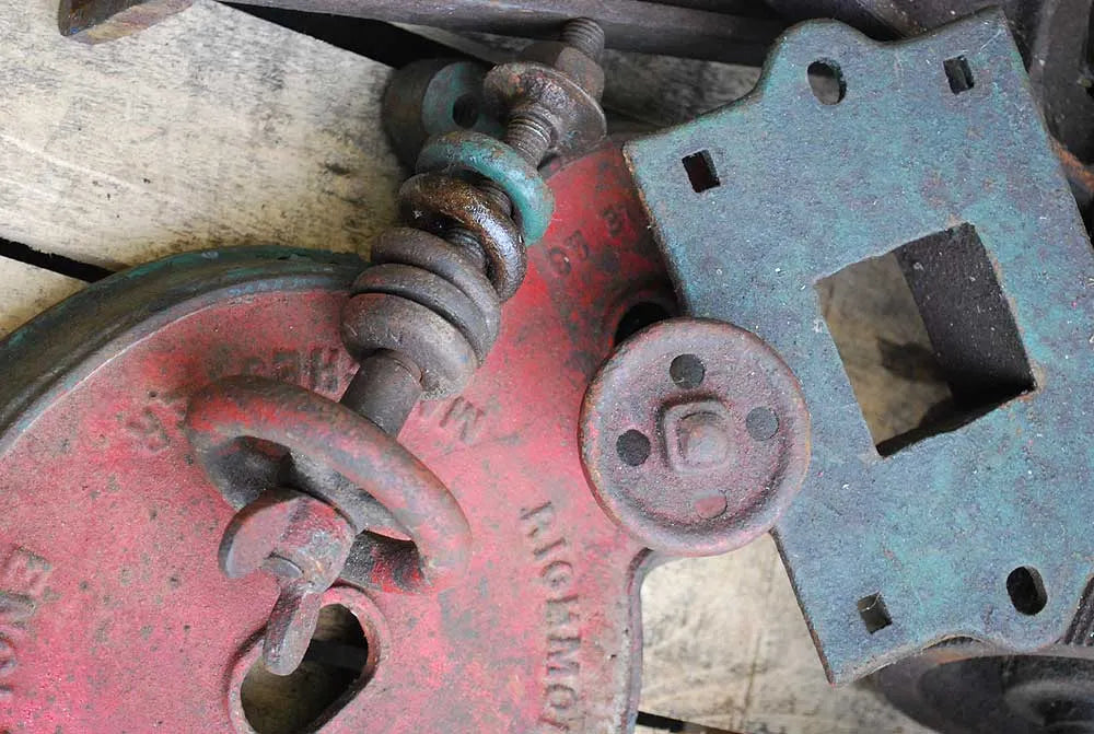 Dismantled cast iron corn mill