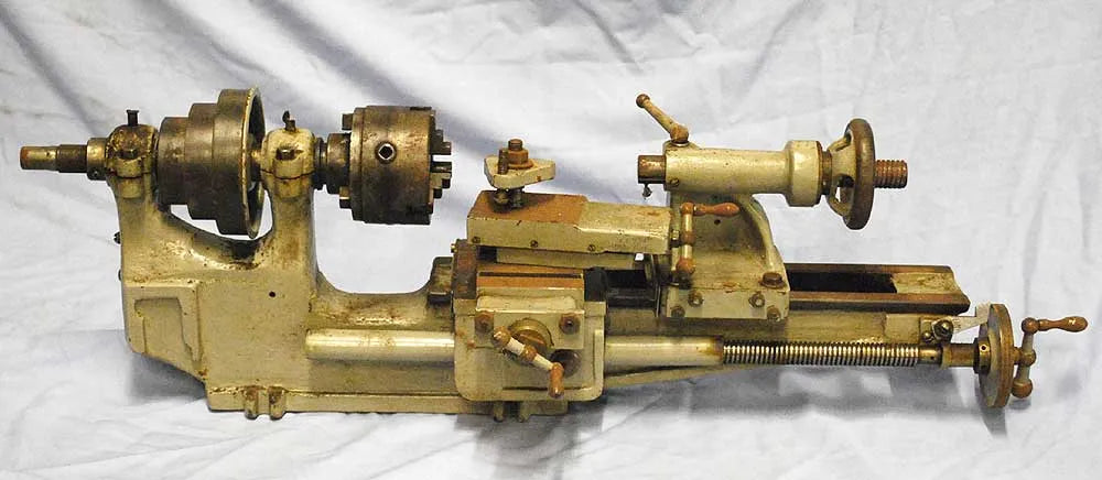 Small lathe with dividing plate, chucks etc