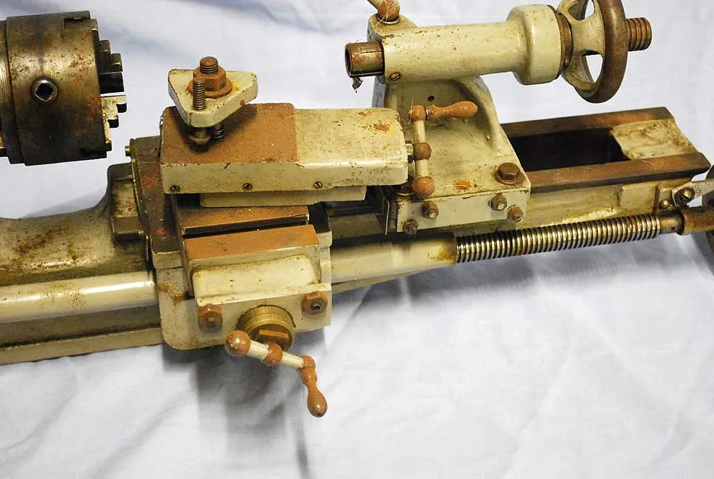 Small lathe with dividing plate, chucks etc