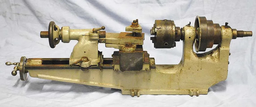 Small lathe with dividing plate, chucks etc