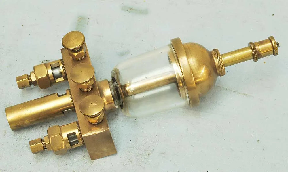 Three branch sight feed lubricator