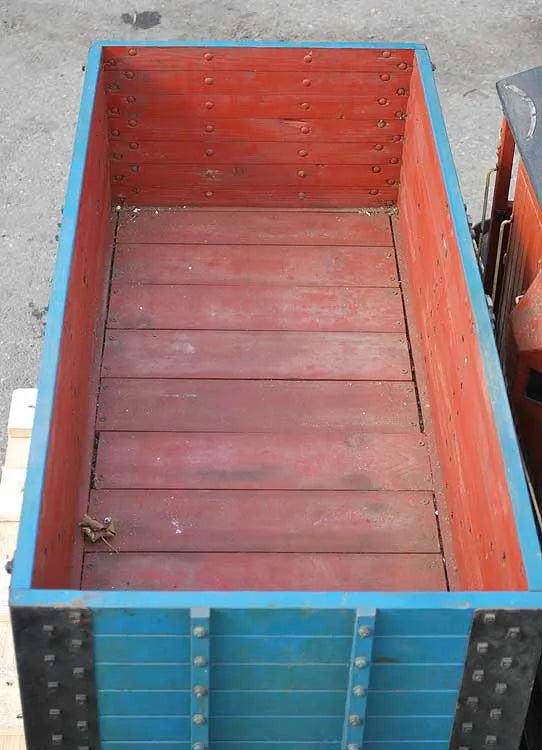 Five 10 1/4 inch gauge wagons and brake van