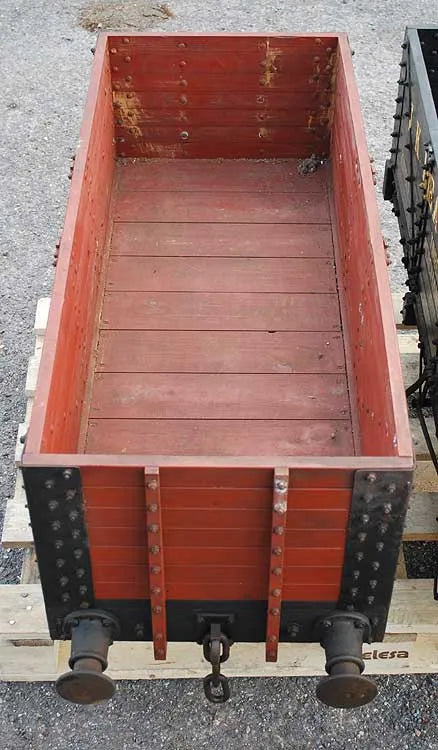 Five 10 1/4 inch gauge wagons and brake van
