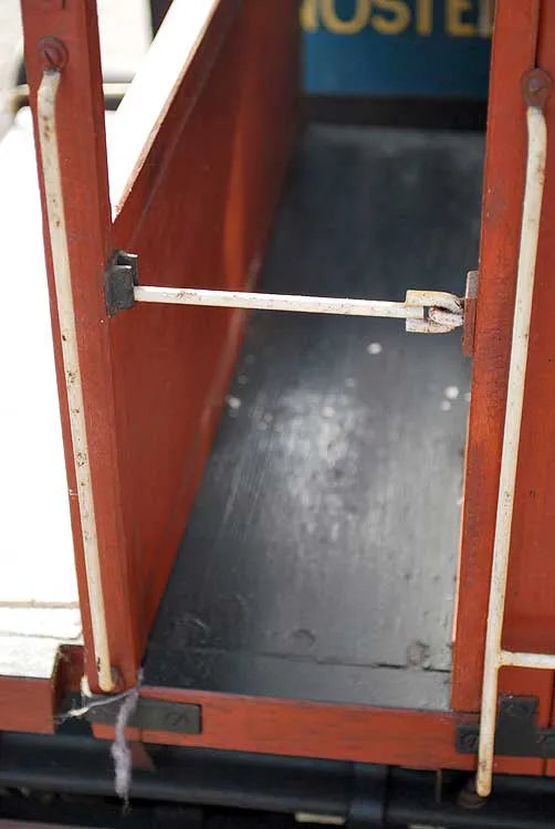 Five 10 1/4 inch gauge wagons and brake van