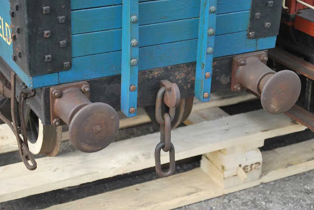 Five 10 1/4 inch gauge wagons and brake van