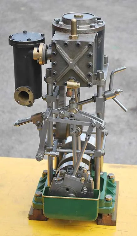 Greenly vertical engine with reversing gear