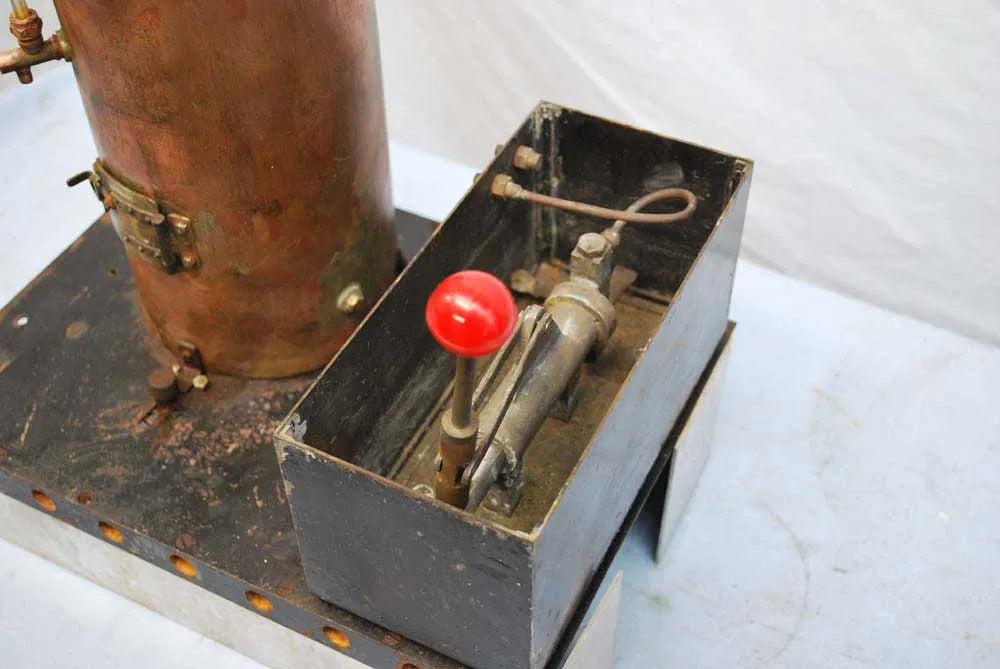 Vertical copper boiler with hand pump
