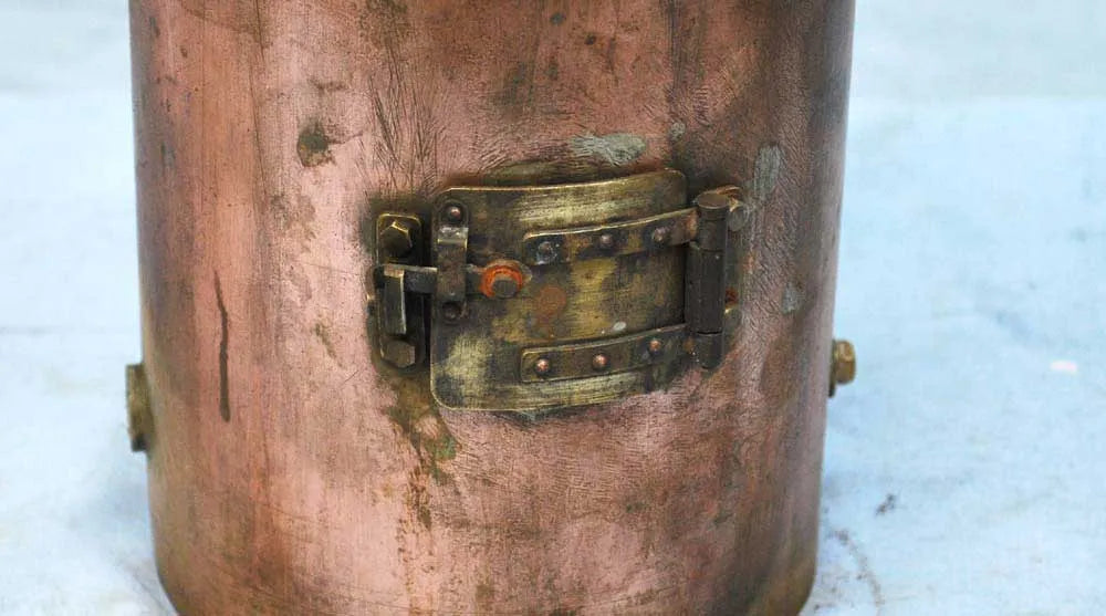 Vertical copper boiler with hand pump