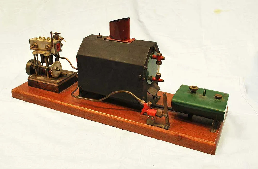 Vertical twin with boiler & hand pump