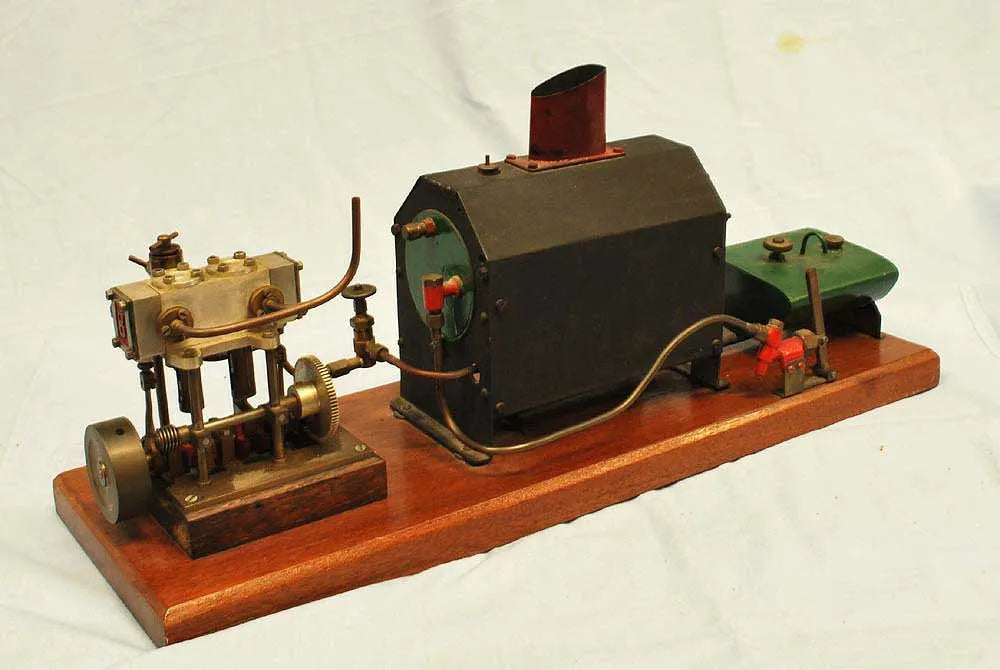 Vertical twin with boiler & hand pump