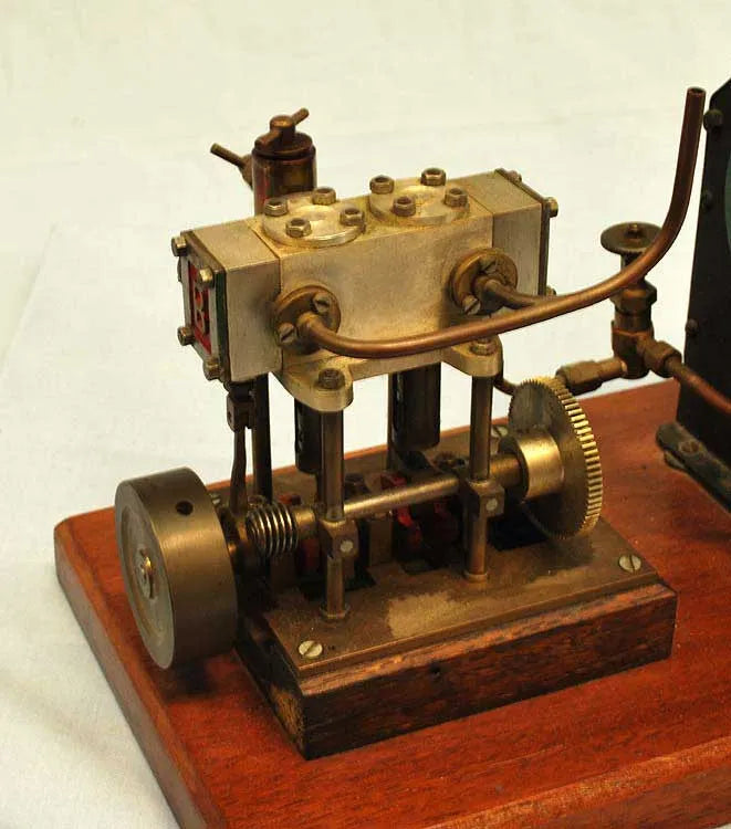 Vertical twin with boiler & hand pump