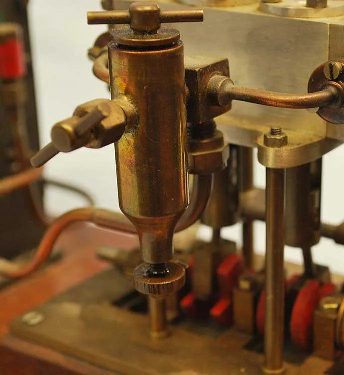 Vertical twin with boiler & hand pump