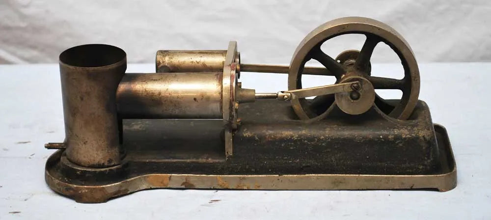 Hot air engine on cast base with wick burner