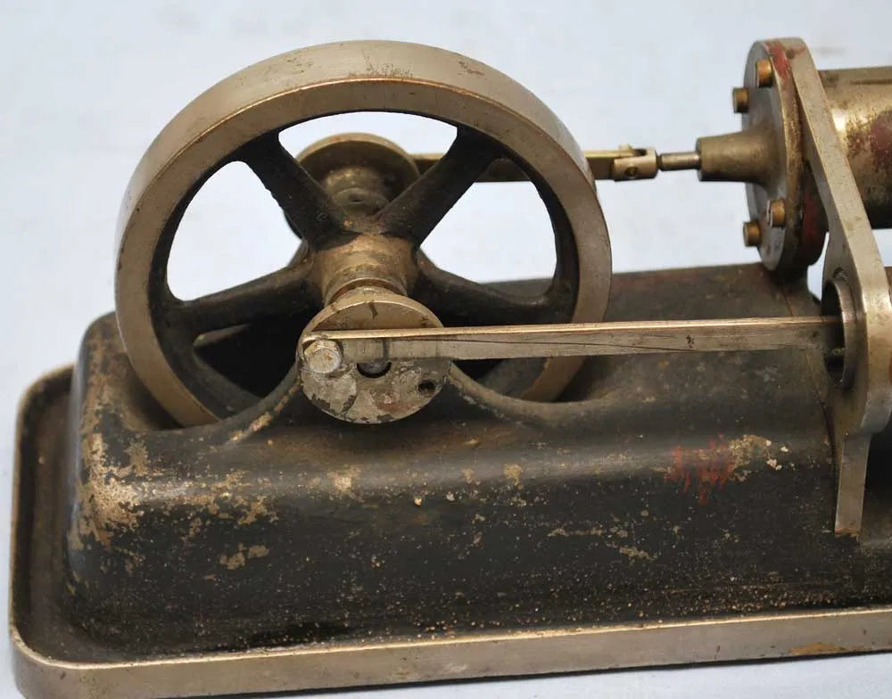 Hot air engine on cast base with wick burner
