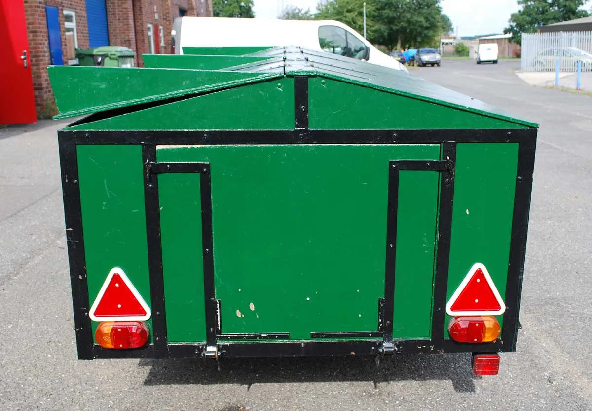 Portable track with trailer