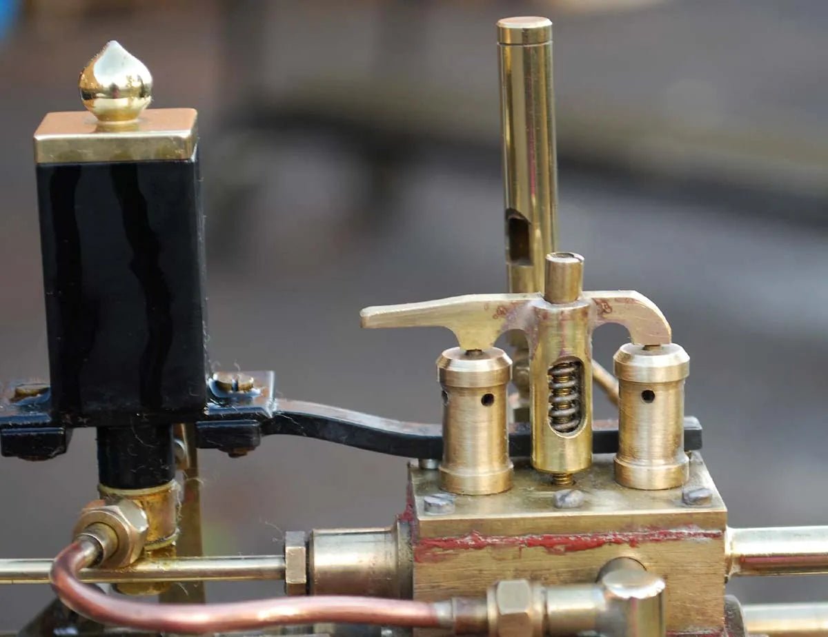 Markie spirit-fired Showmans engine with bowser