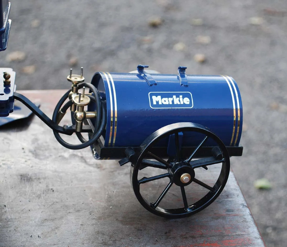 Markie spirit-fired Showmans engine with bowser