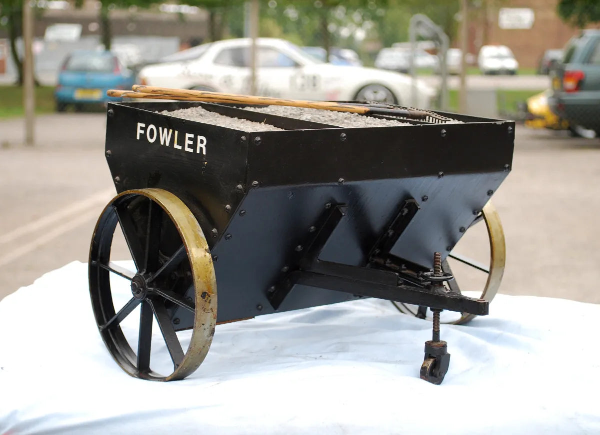 Five 2 inch scale road-laying models