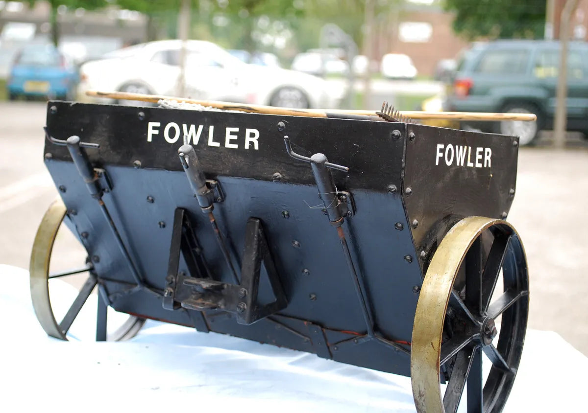 Five 2 inch scale road-laying models