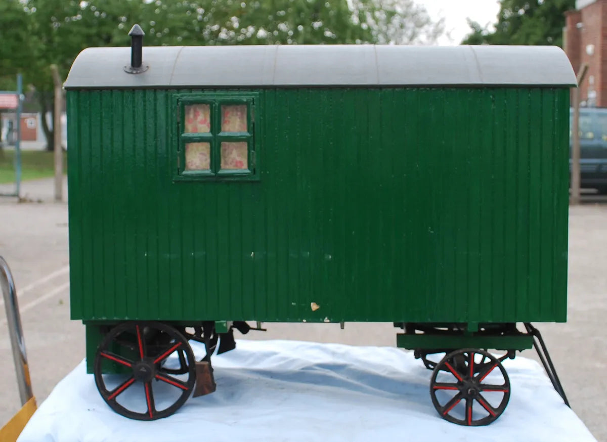Five 2 inch scale road-laying models