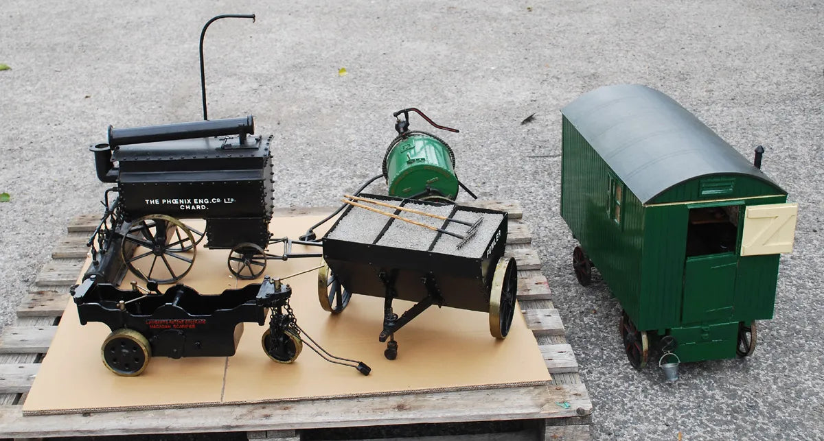 Five 2 inch scale road-laying models