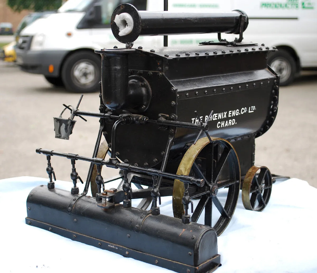 Five 2 inch scale road-laying models
