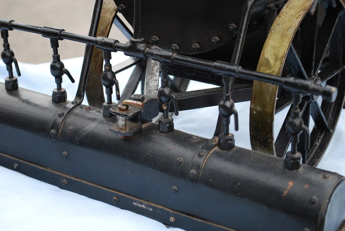 Five 2 inch scale road-laying models