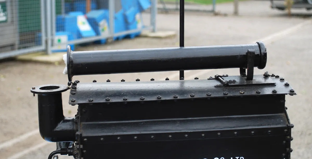 Five 2 inch scale road-laying models