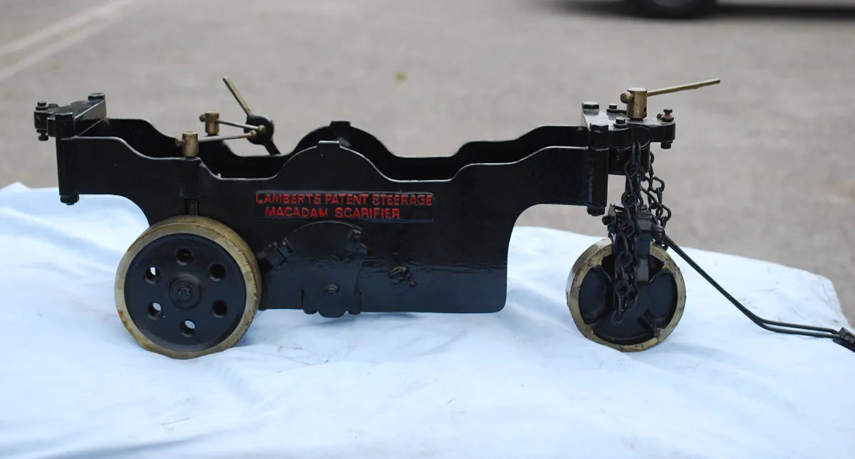Five 2 inch scale road-laying models