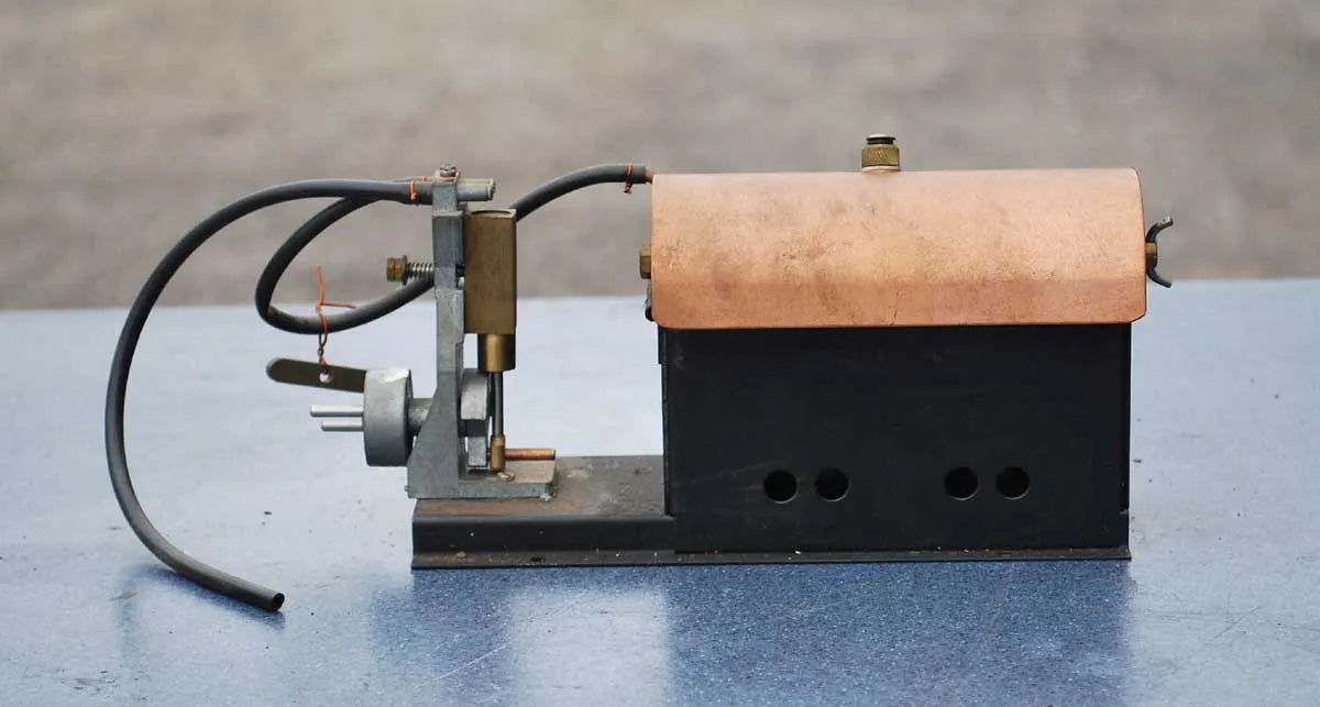 Spirit-fired copper boiler with oscillating engine