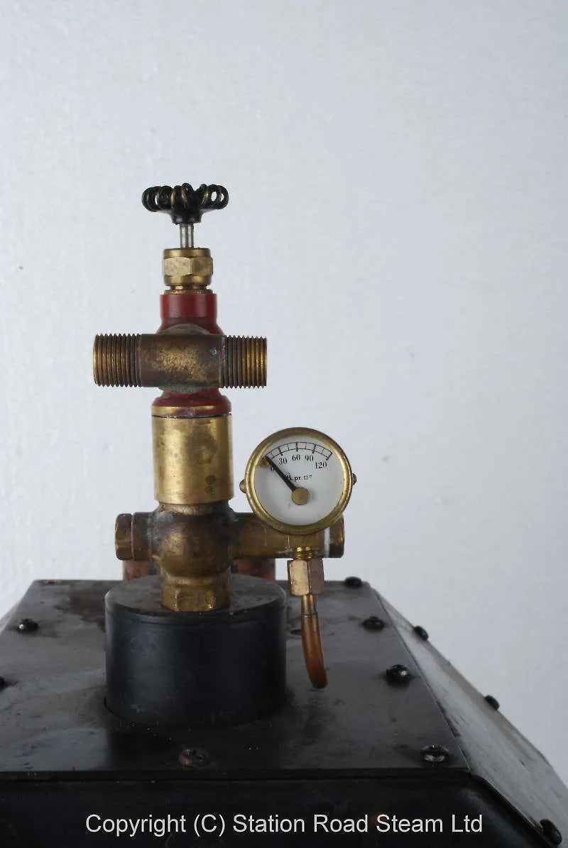 Stuart "Mendip" coal-fired boiler with hand pump