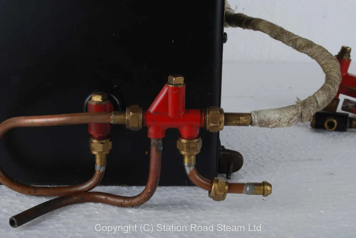 Stuart "Mendip" coal-fired boiler with hand pump