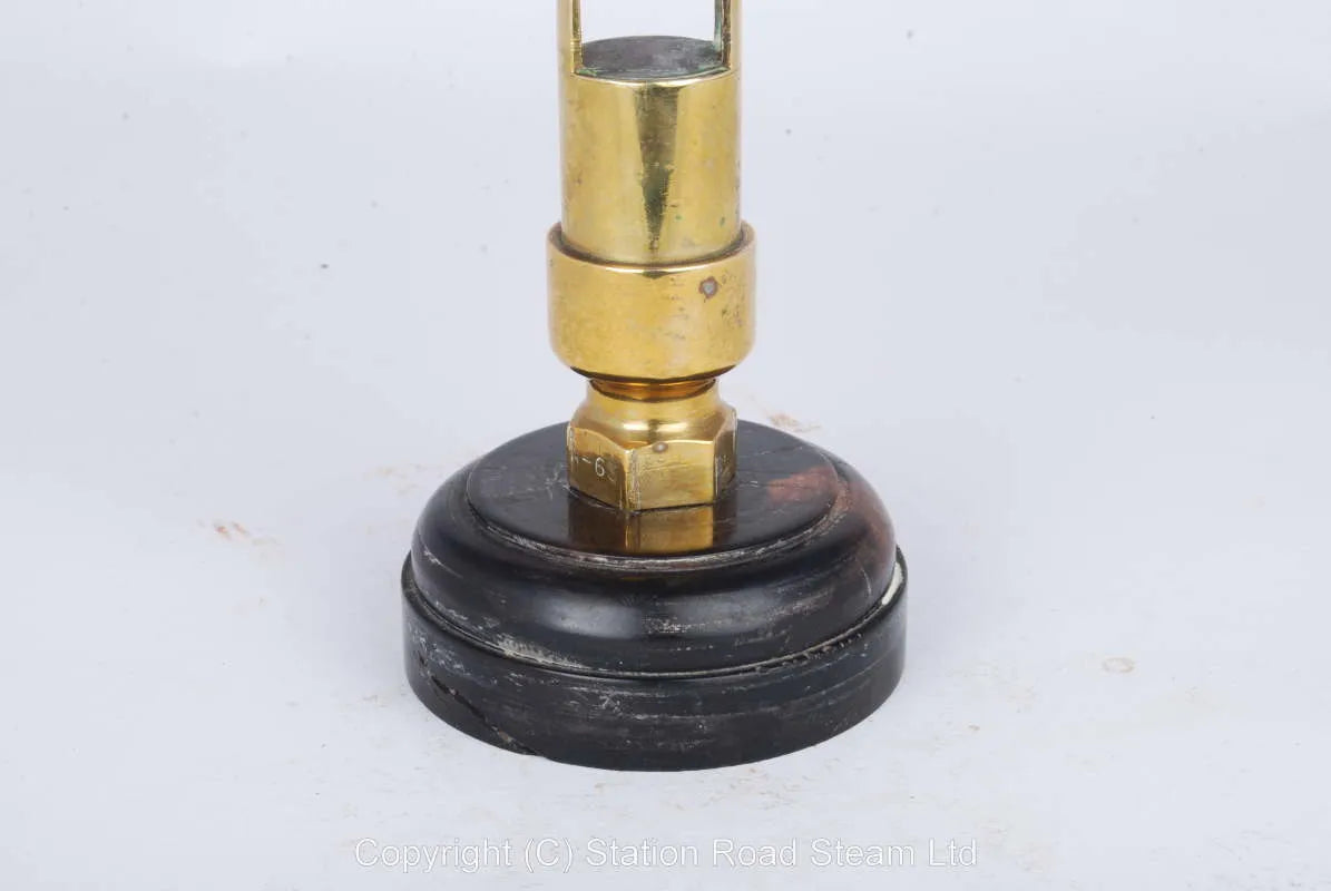 Organ pipe type whistle on wooden base