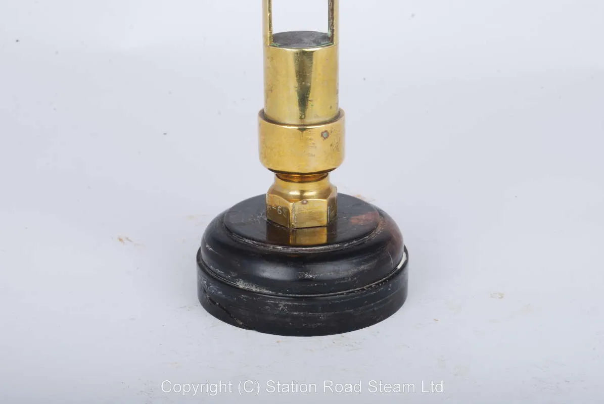 Organ pipe type whistle on wooden base