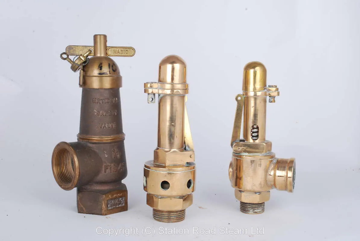 Three Nabic polished brass safety valves