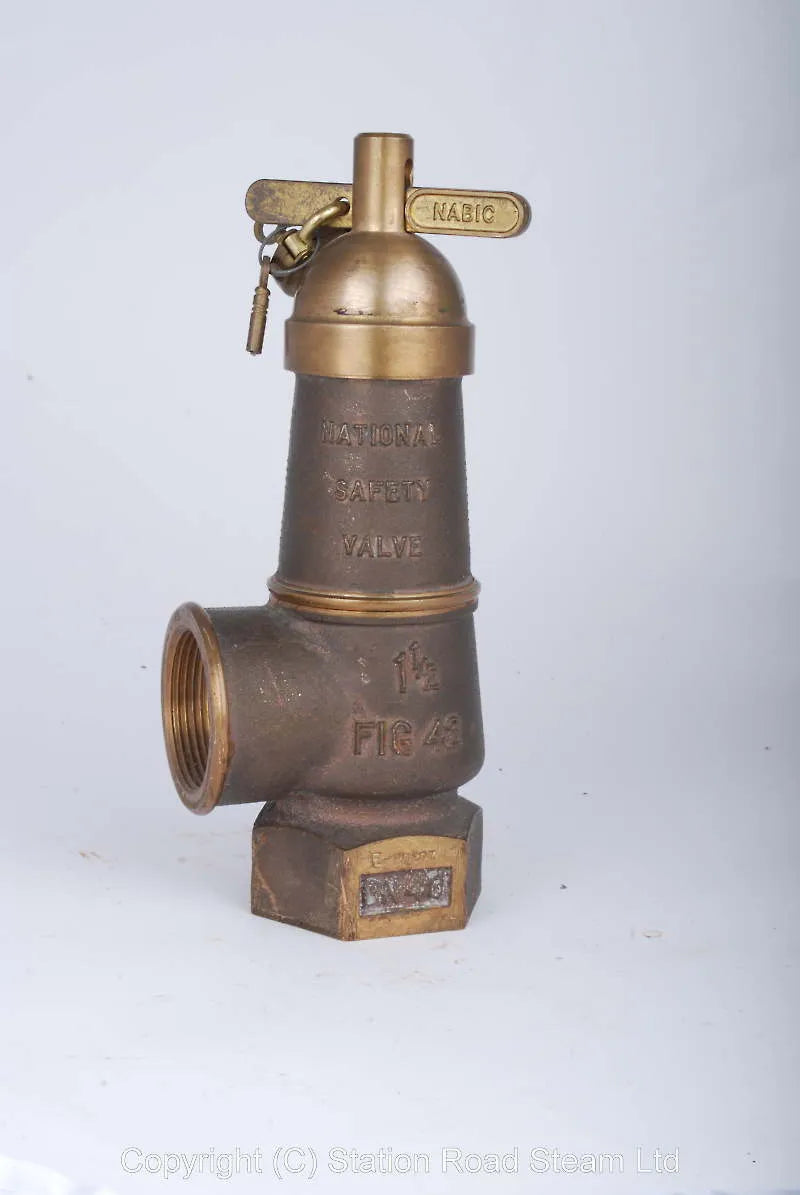Three Nabic polished brass safety valves