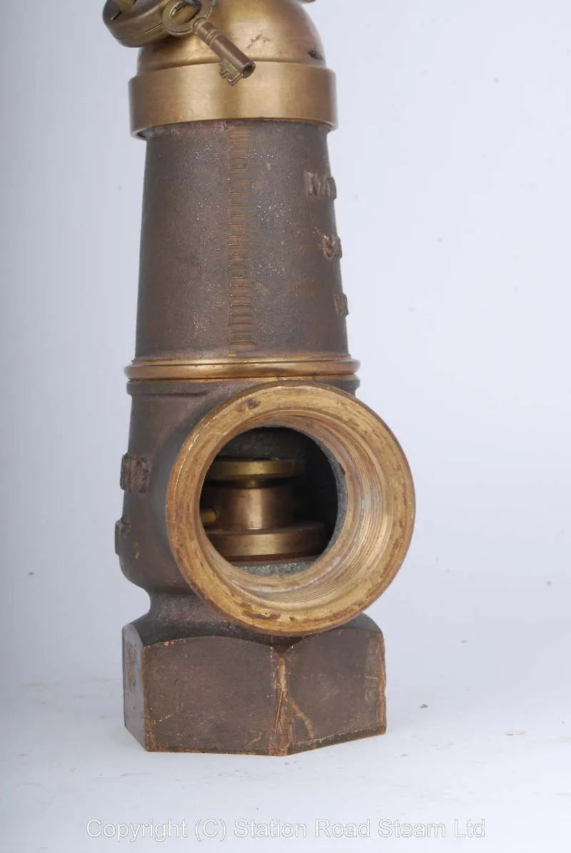 Three Nabic polished brass safety valves