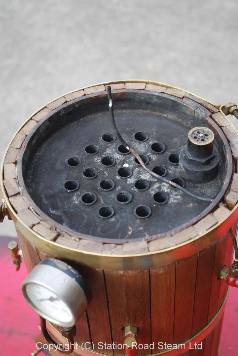 Large wooden clad copper vertical boiler