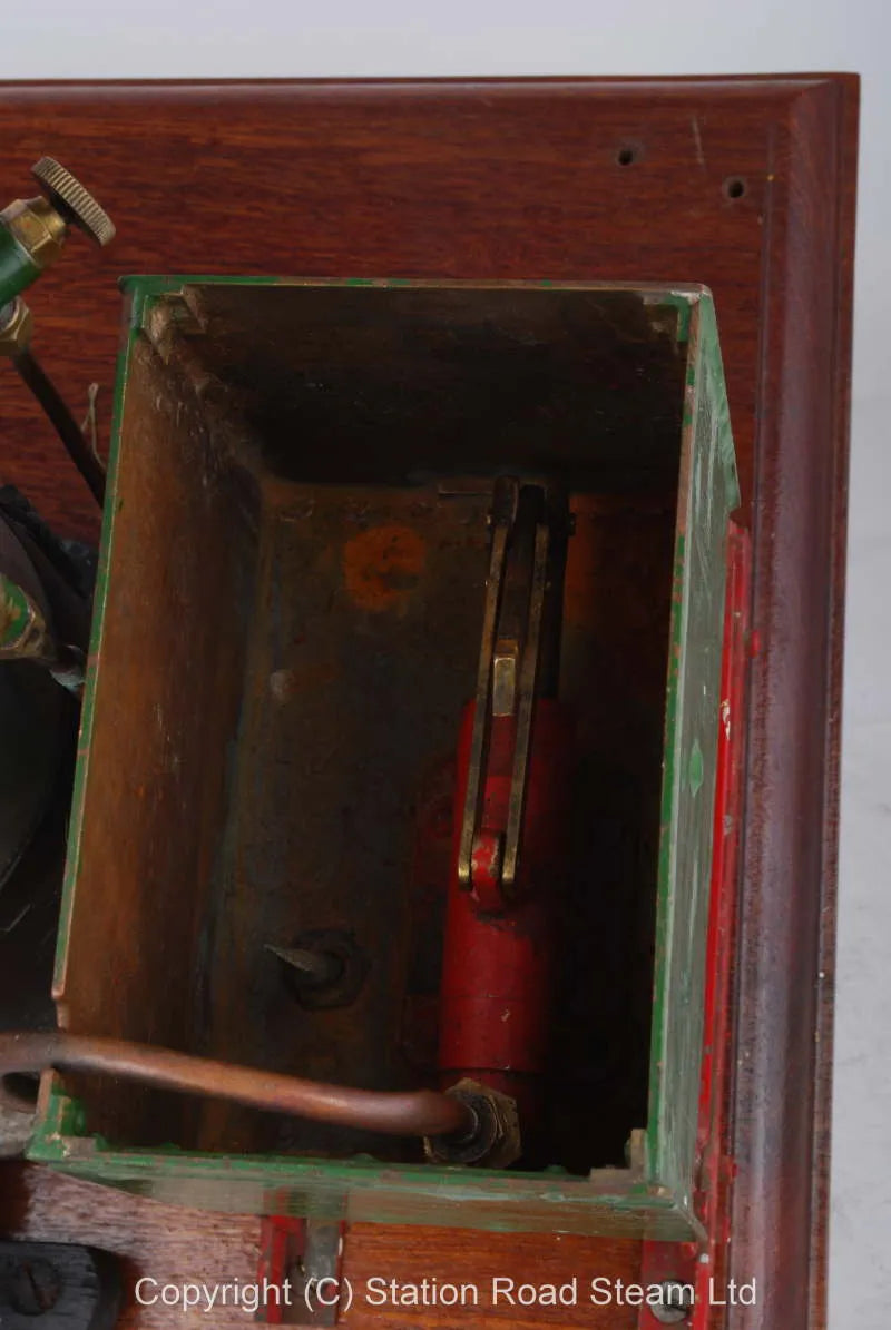 Gas fired boiler with water tank and hand pump
