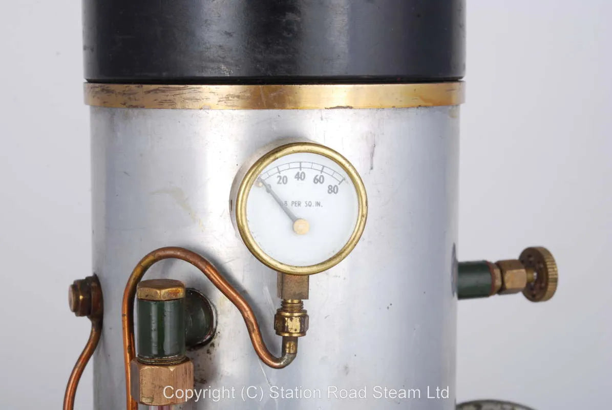 Gas fired boiler with water tank and hand pump