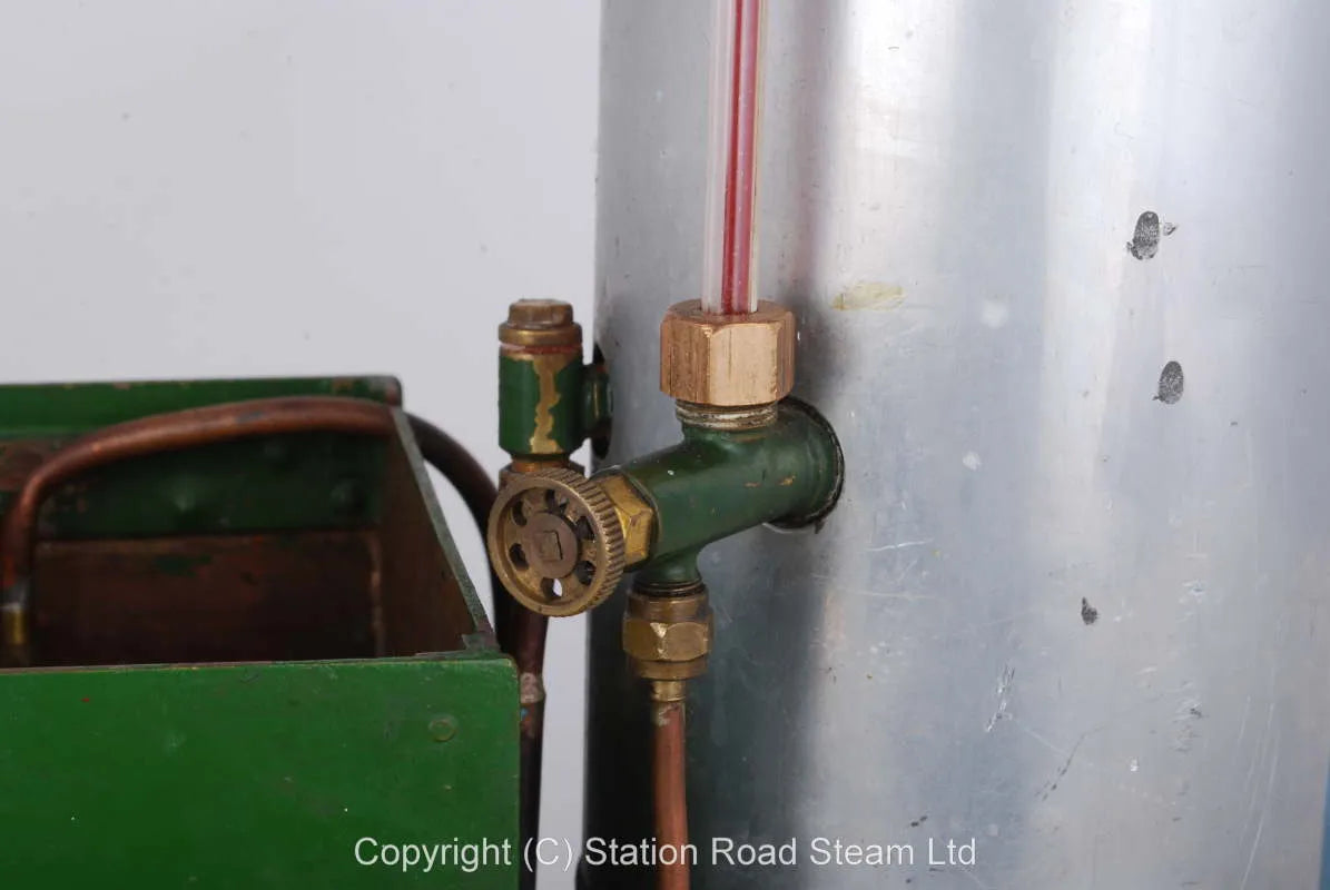 Gas fired boiler with water tank and hand pump