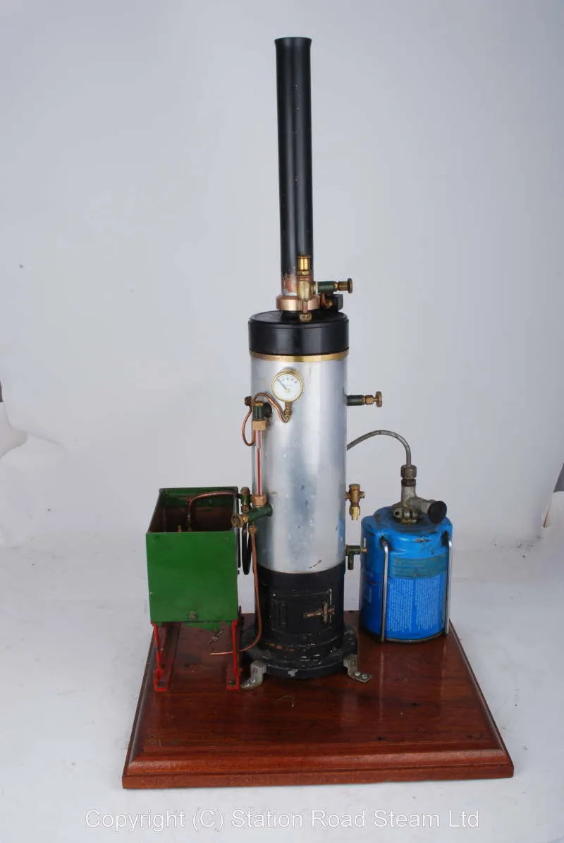 Gas fired boiler with water tank and hand pump