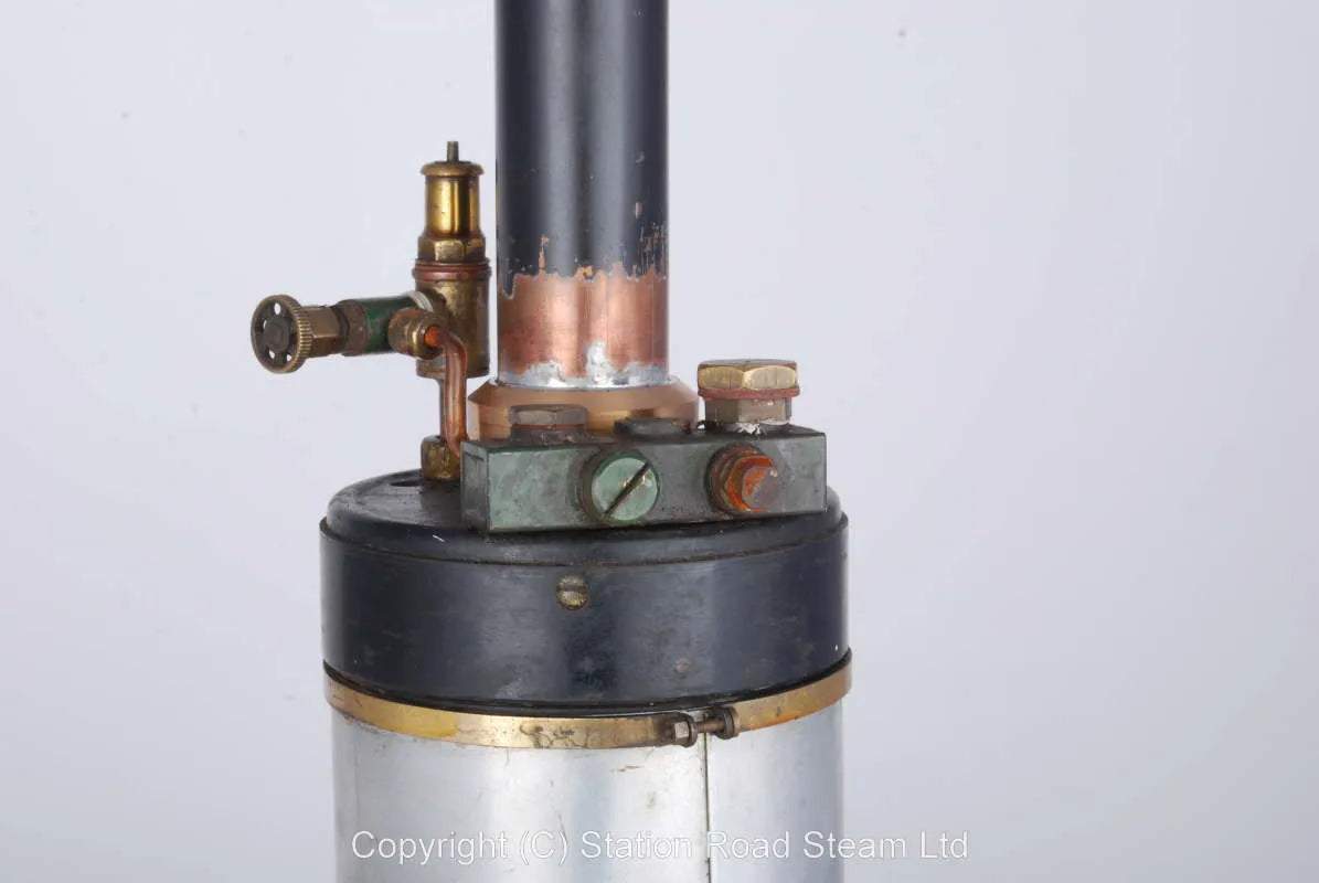 Gas fired boiler with water tank and hand pump